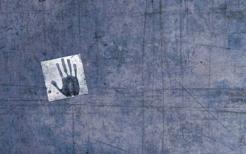 Handprint on Metal Surface — Blue
