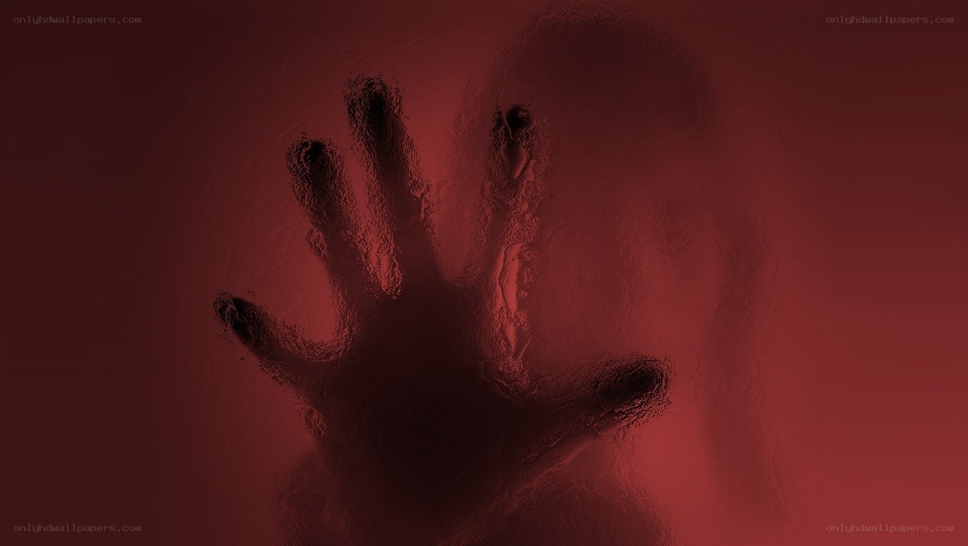 handprint on red glass