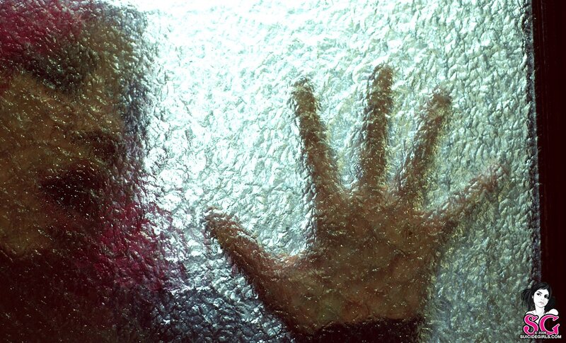 handprint on textured glass