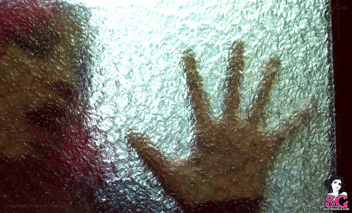 handprint on textured glass
