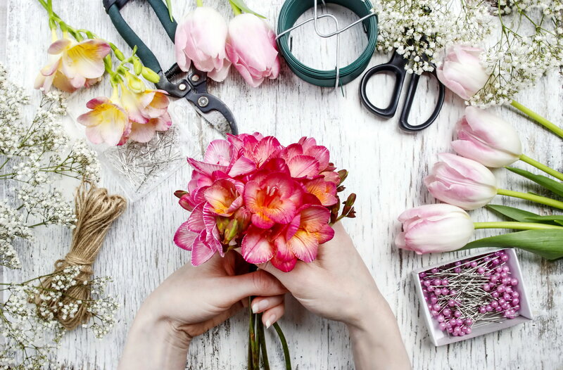 Hands Arranging Flowers