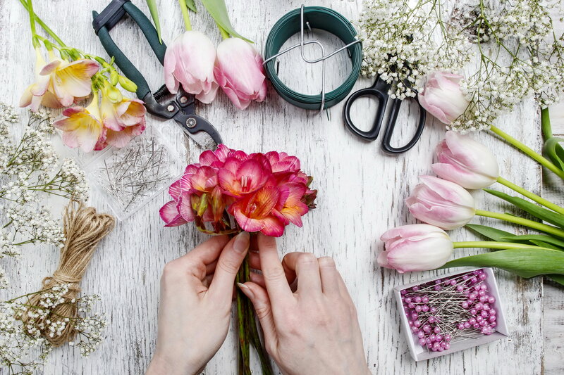 Hands Arranging Flowers — White