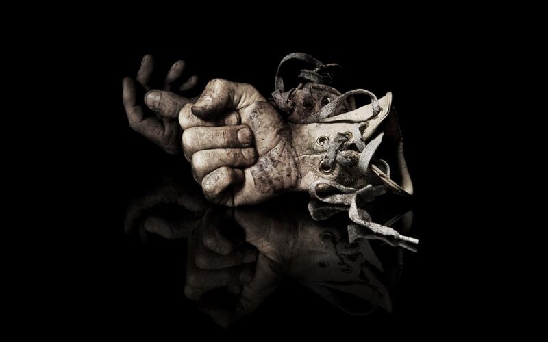 hands bound with shoe