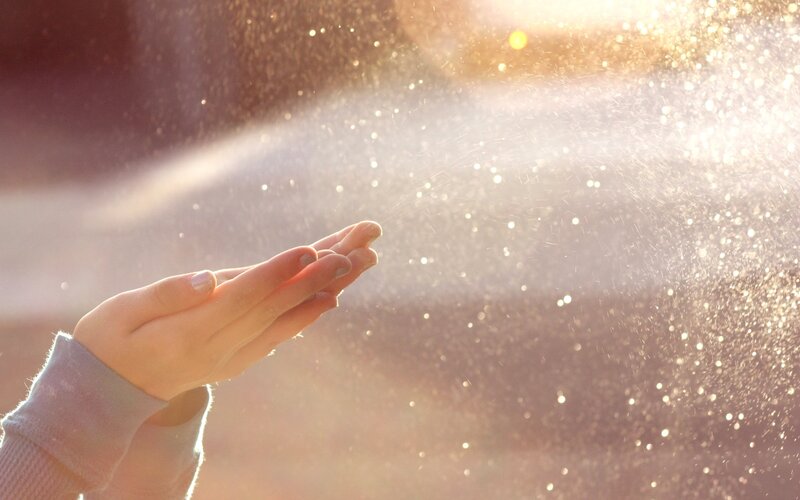 Hands Catching Water Spray — Gold, Serene