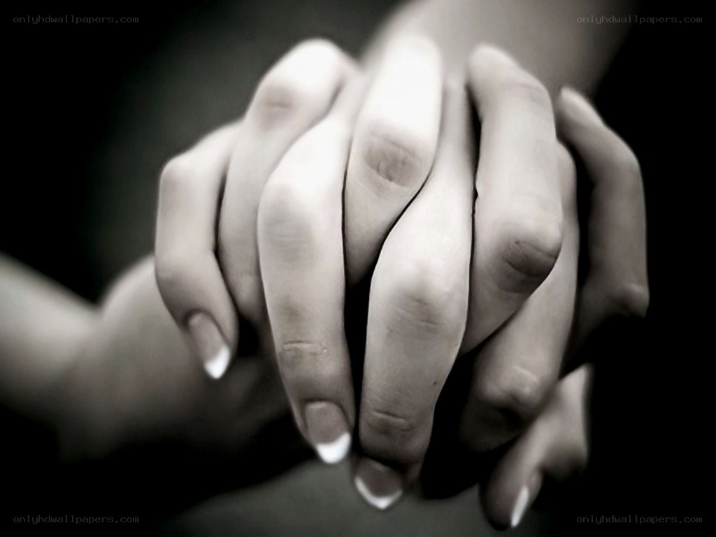 hands clasped in unity