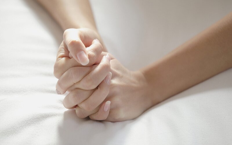 Hands Clasped Together — White, Calm, Photograph