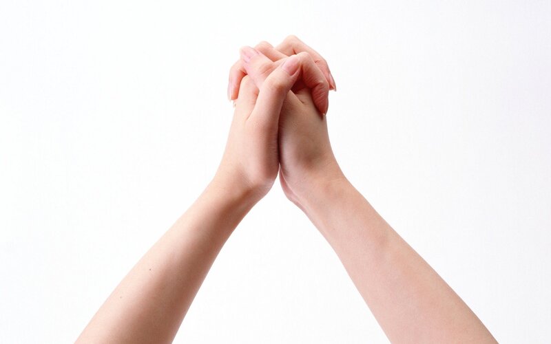 Hands Clasped Together — White