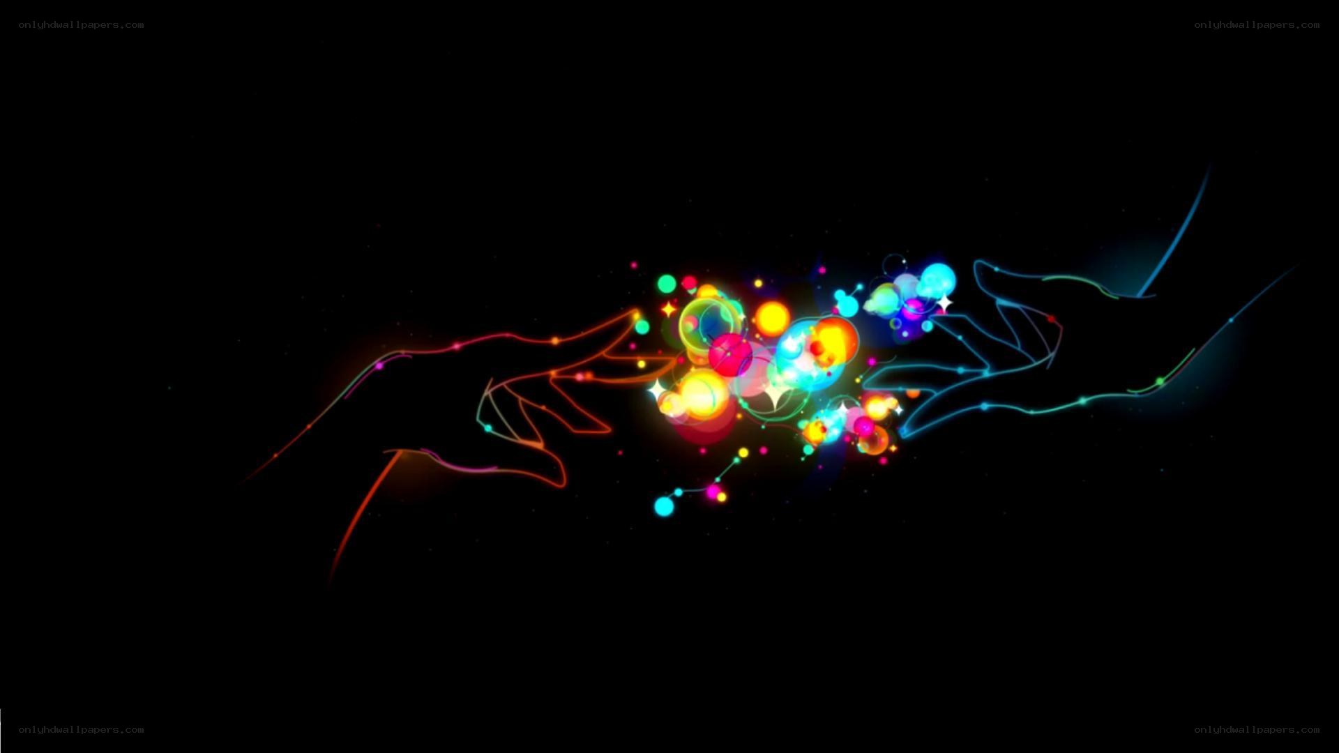 hands connecting with colorful particles