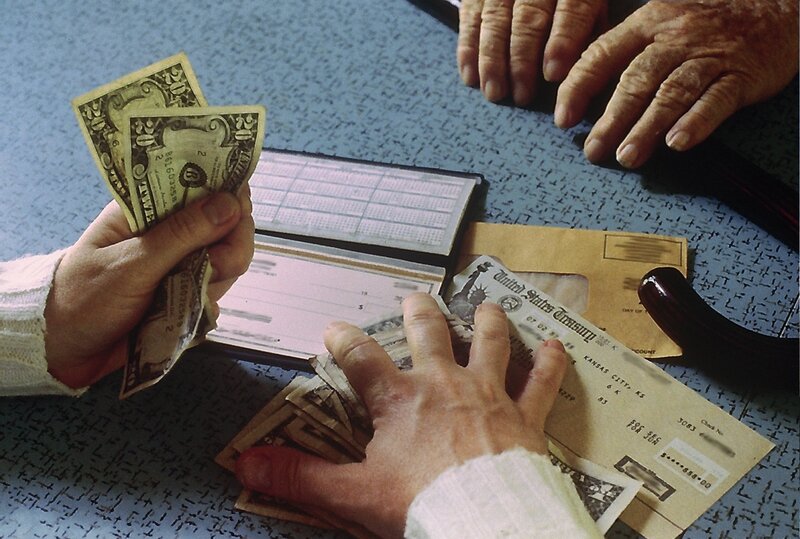 Hands Counting Money