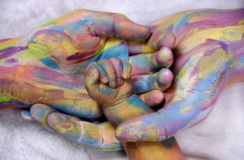 Hands Covered in Paint