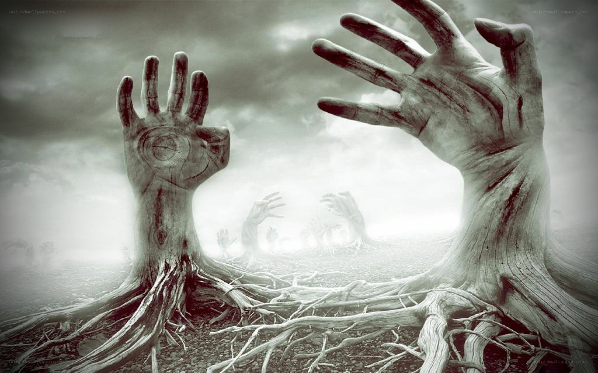 hands emerging from the ground