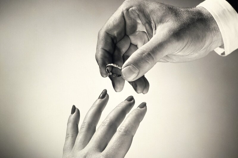 Hands Exchanging Ring