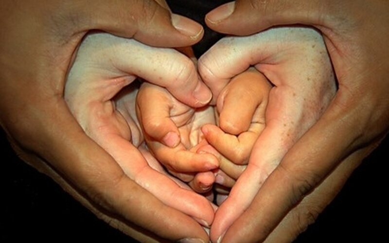 hands forming a heart shape