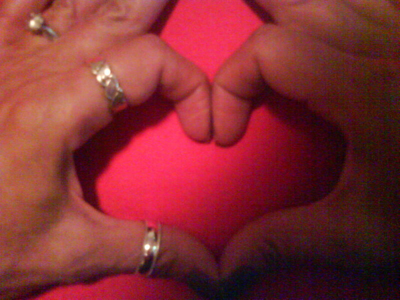 Hands Forming Heart Shape — Red