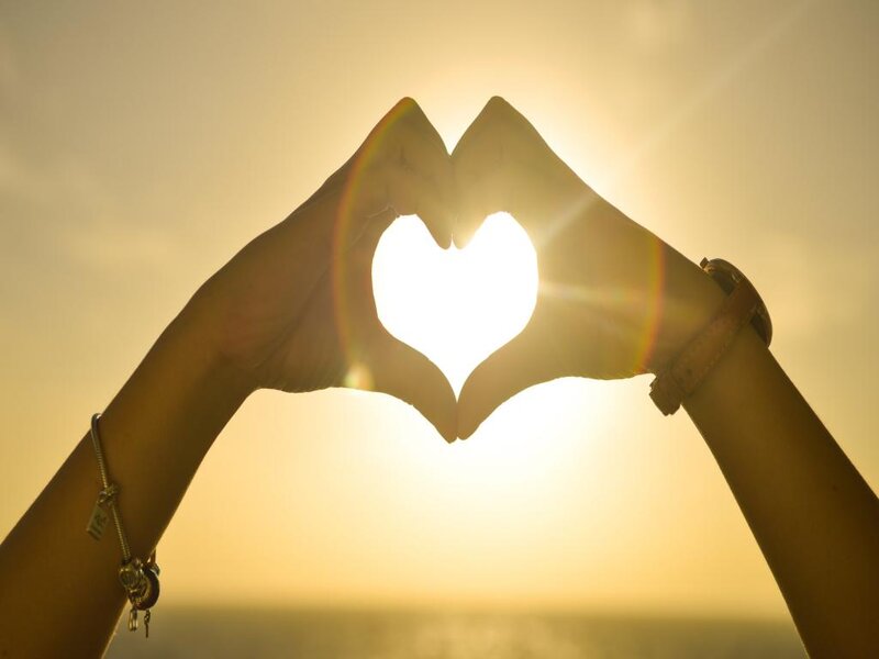 Hands Forming Heart Shape — Yellow, Serene