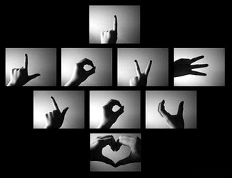 Hands Forming Letters