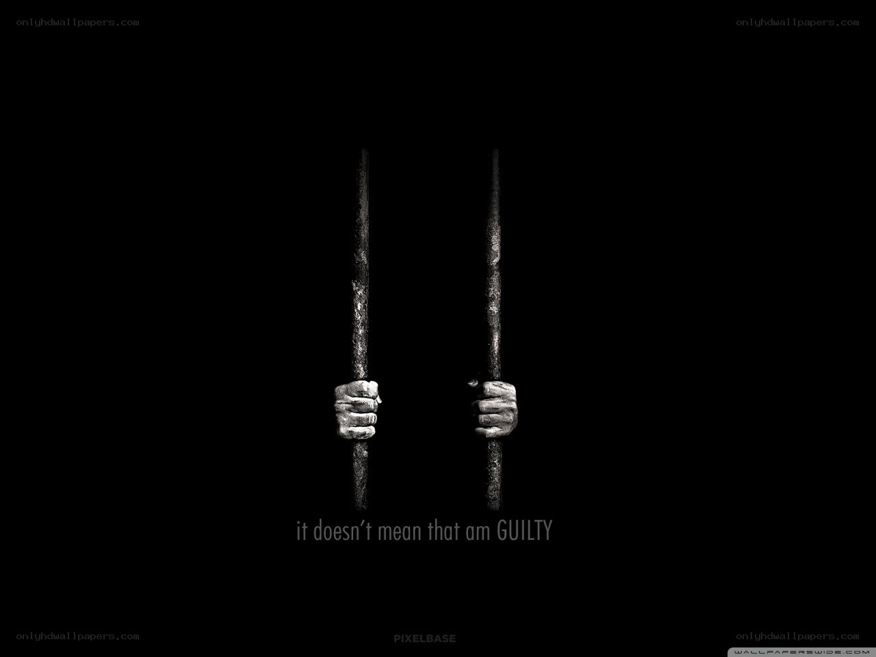 hands gripping prison bars