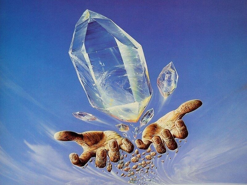 hands holding a crystal