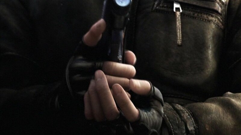 Hands Holding a Flashlight