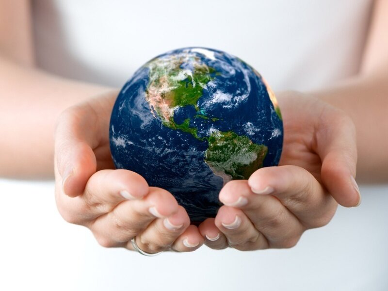 hands holding a globe