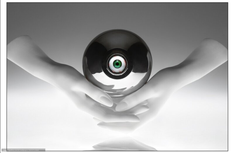 hands holding an eye ball