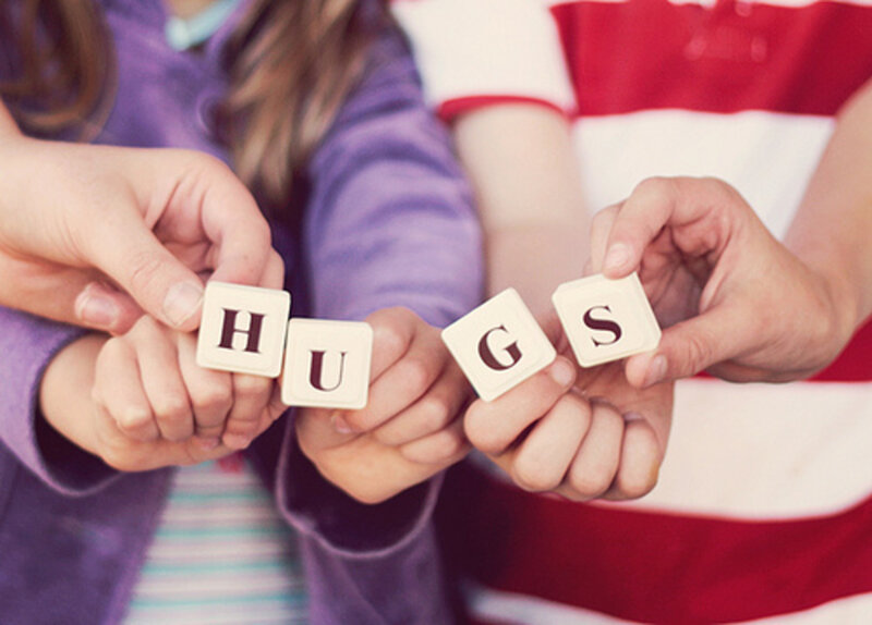Hands Holding Blocks