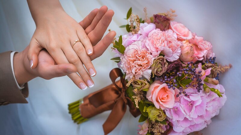 Hands Holding Bouquet — Pink