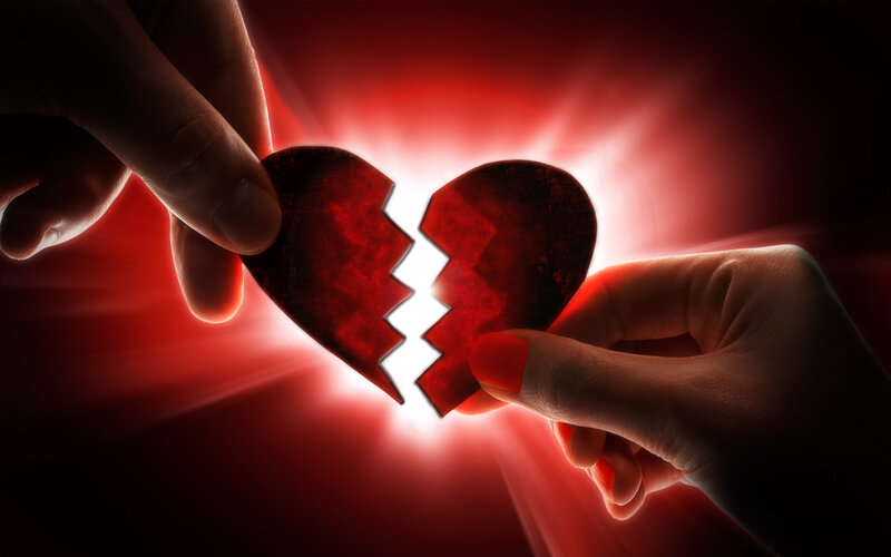 Hands Holding Broken Heart — Red