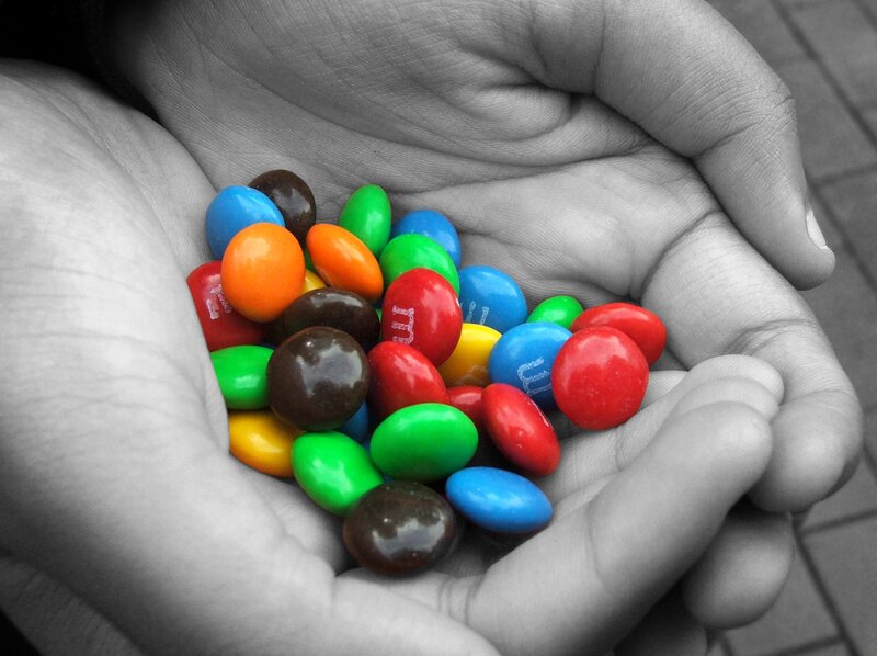 Hands Holding Candies
