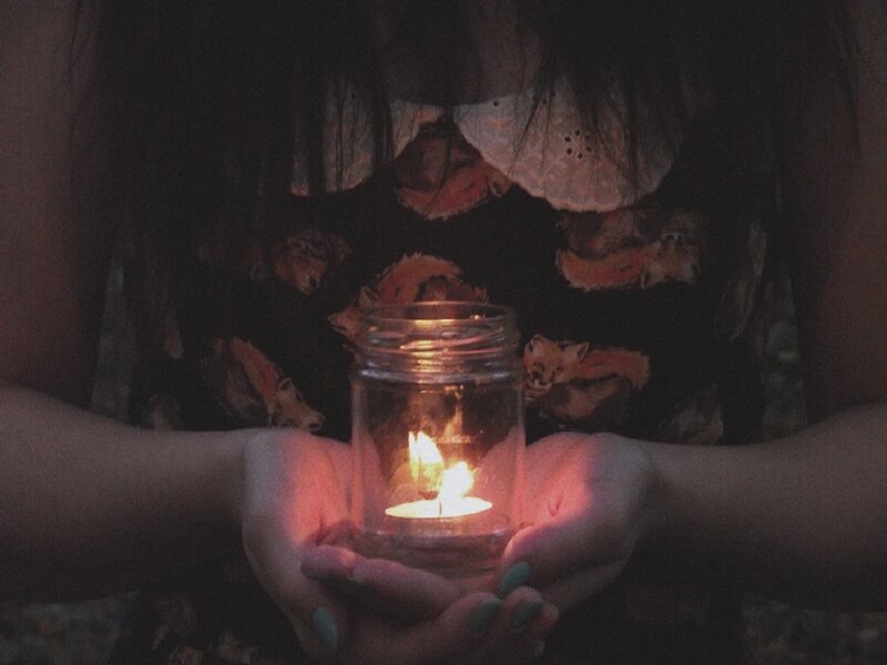 Hands Holding Candle — Black, Calm