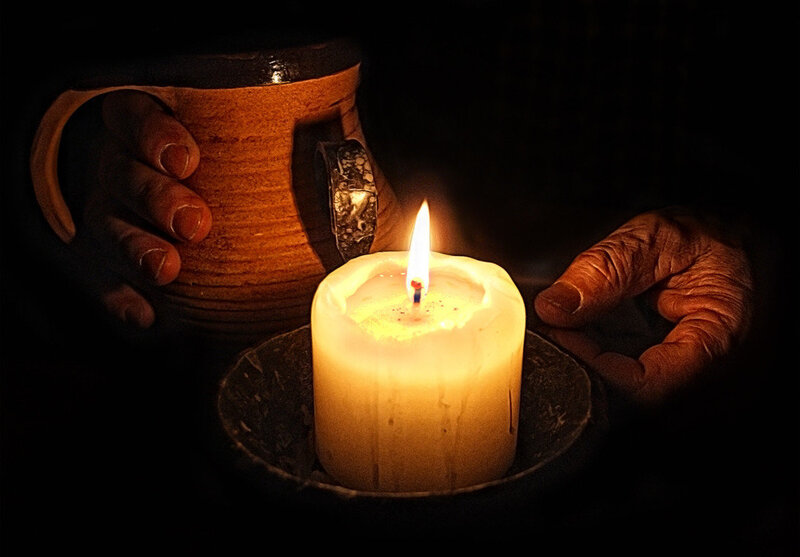 Hands Holding Candle — Yellow