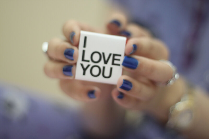 Hands Holding Card