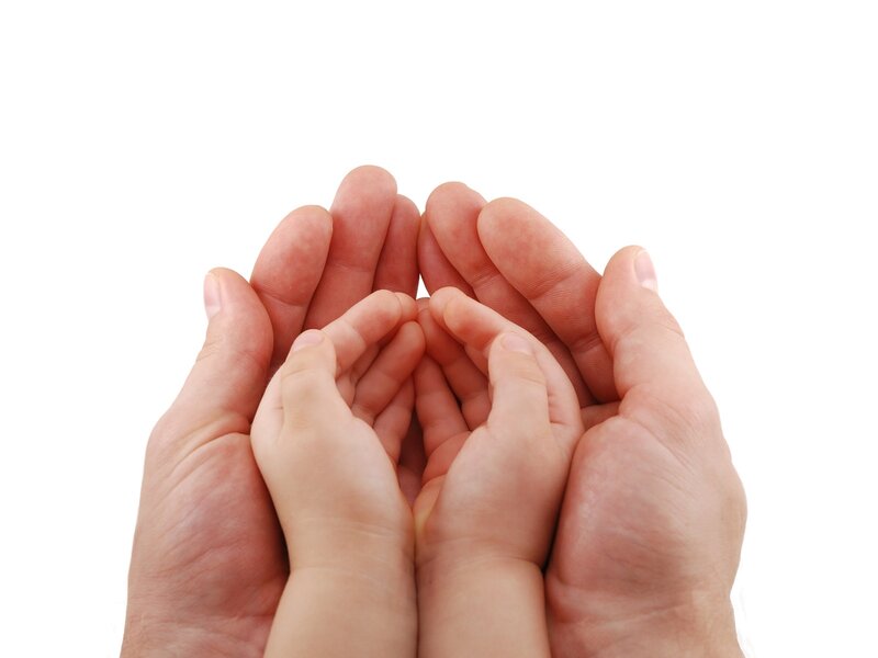 hands holding child hands