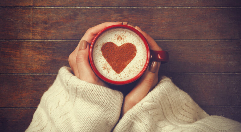 Hands Holding Coffee Cup — Brown
