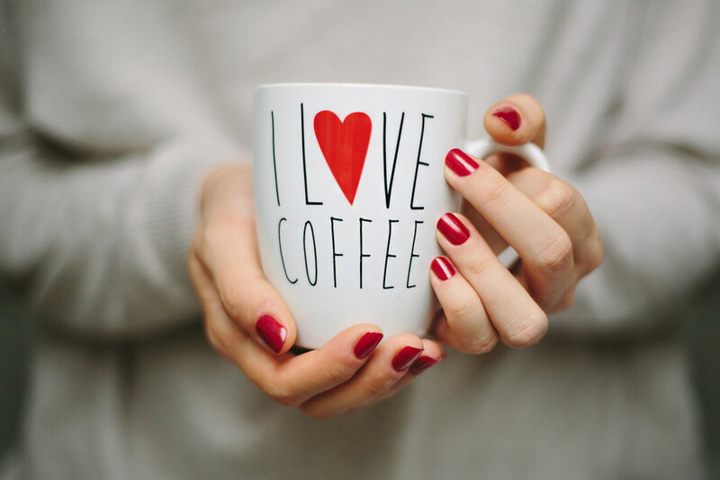 Hands Holding Coffee Mug