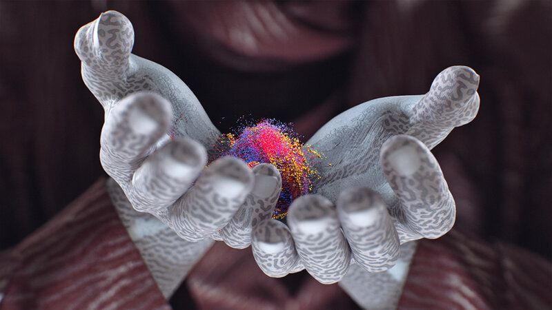 Hands Holding Colorful Particles