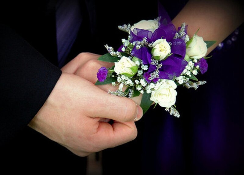 Hands Holding Corsage