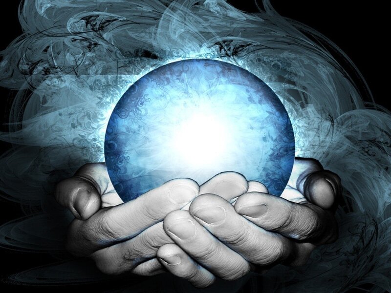 Hands Holding Crystal Ball