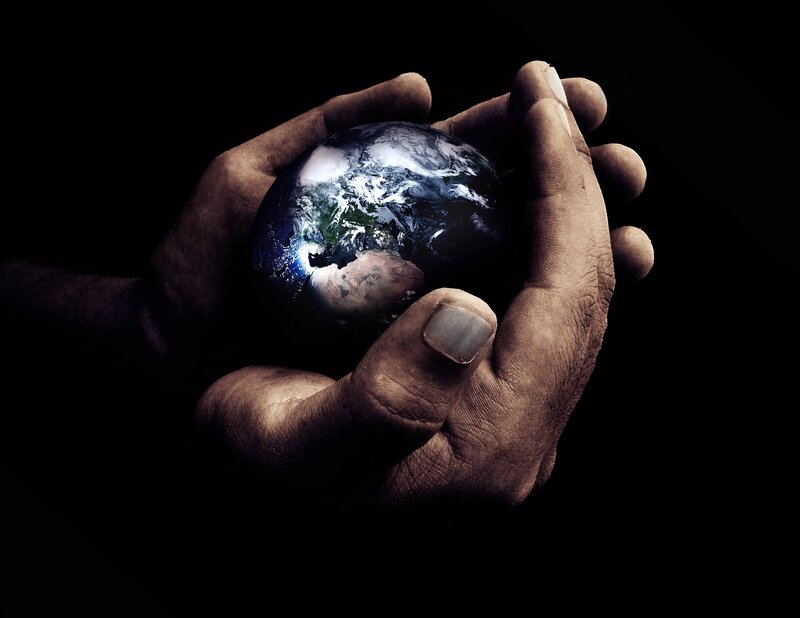 Hands Holding Earth — Black, Dramatic