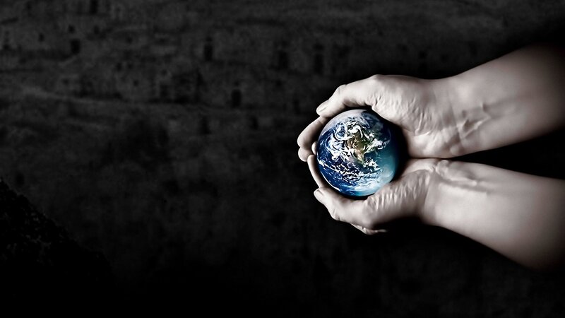 hands holding earth globe