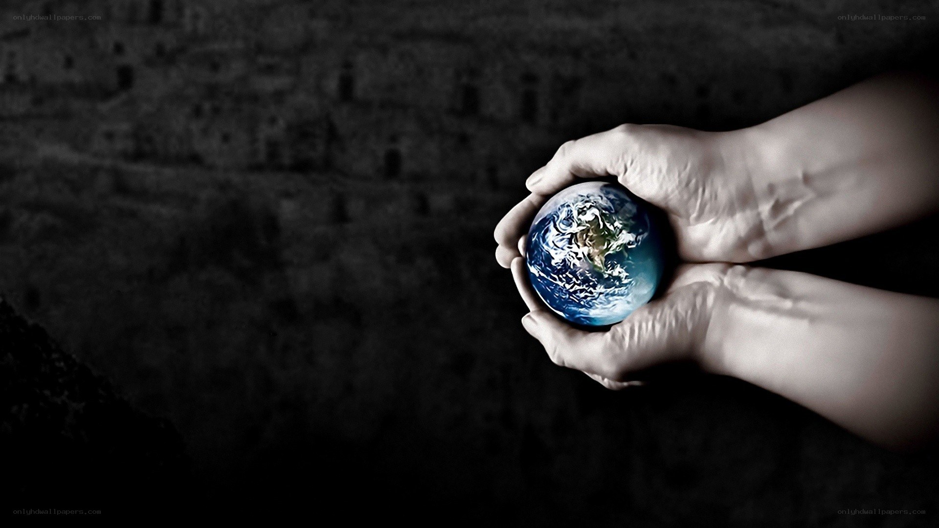 hands holding earth globe