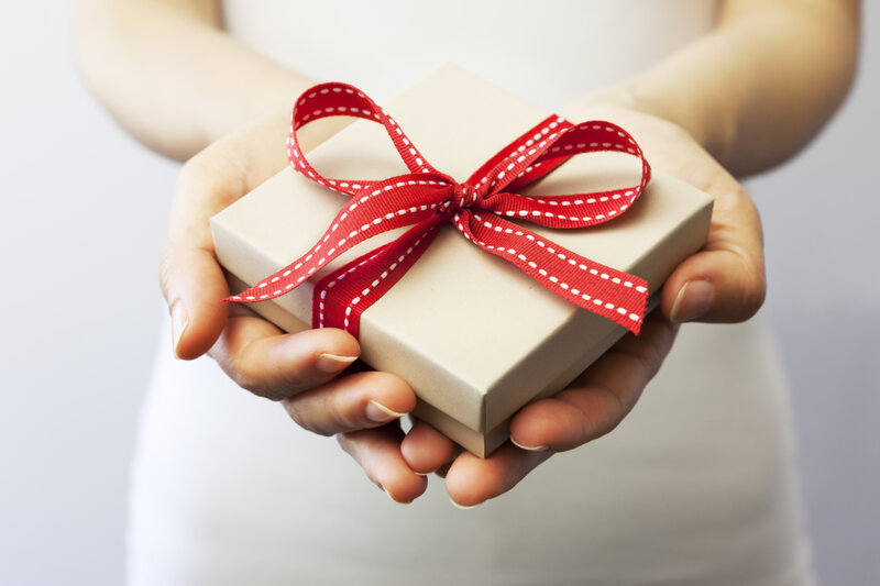 Hands Holding Gift Box — Beige
