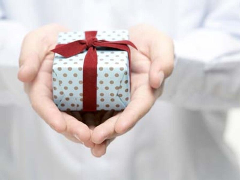 Hands Holding Gift Box