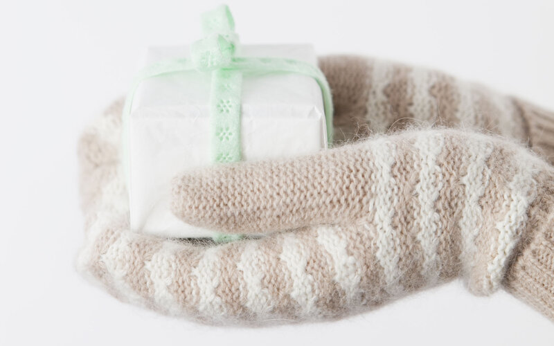 Hands Holding Gift Box — White