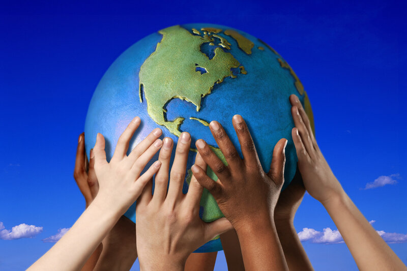 hands holding globe