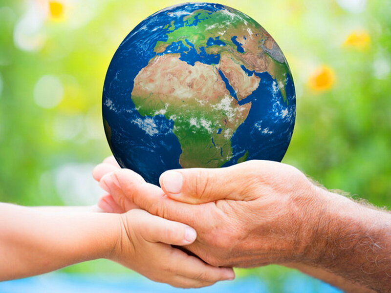 Hands Holding Globe — Green, Peaceful