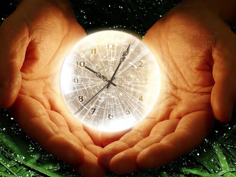 Hands Holding Glowing Clock