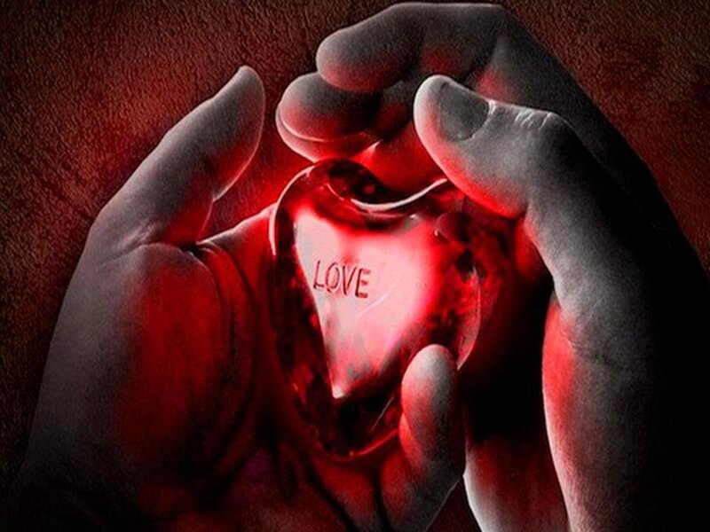 Hands Holding Glowing Heart — Red, Dramatic