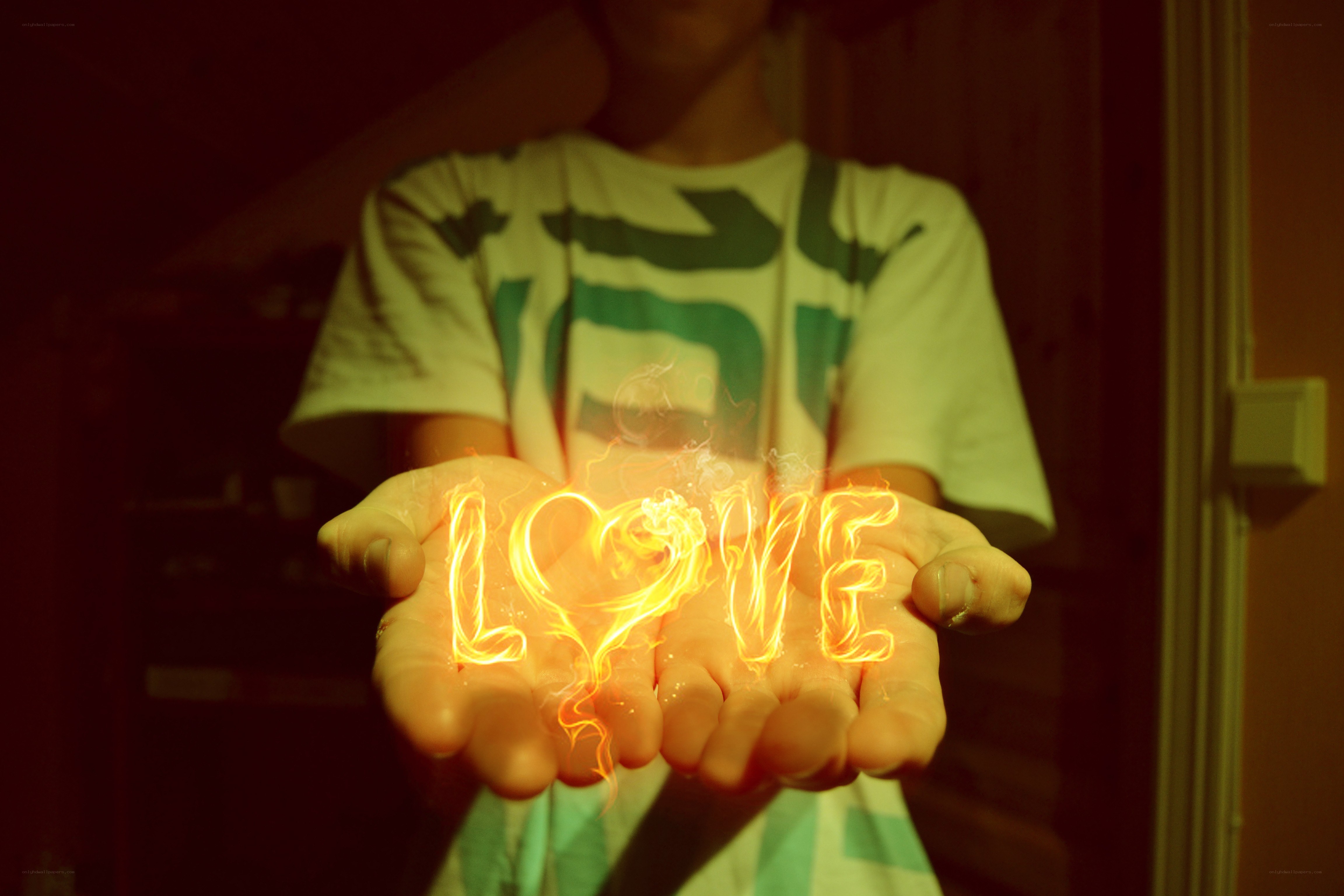 hands holding glowing love