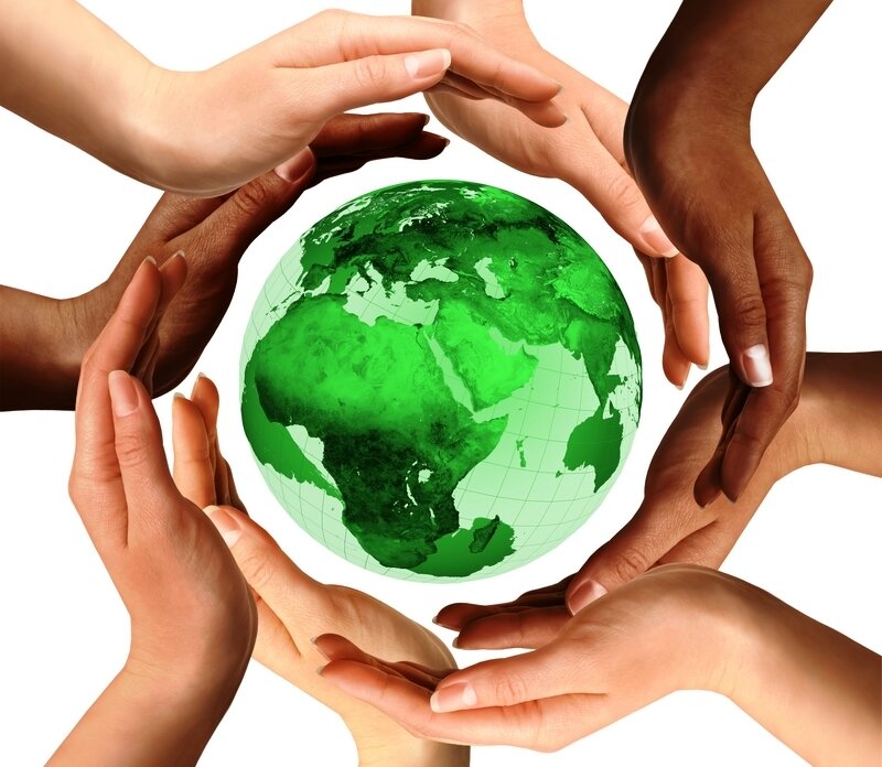 Hands Holding Green Globe — Peaceful